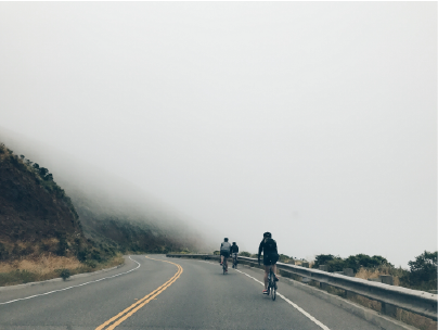 A group of people cycling in the city